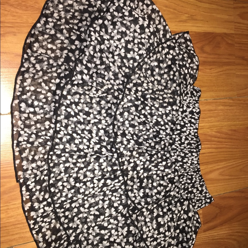 It’s a black and white butterfly skirt for girls